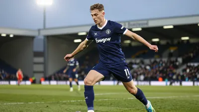 Oxford United Defender Brodie Spencer in Transfer Race with QPR and West Brom